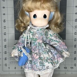 Precious Moments Doll with Floral Dress and Blue Accessories